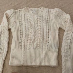 Cream sweater with pouf shoulder